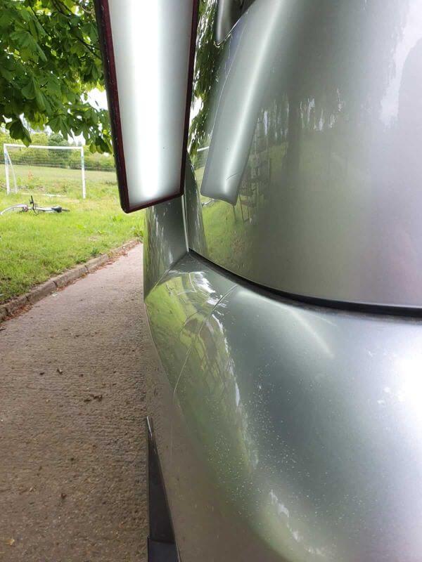 Damage after DIY Dent removal repaired with professional Dent master